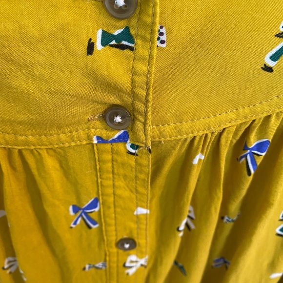Anthropologie Mustard Yellow Bow Print Button Top - Picture 6 of 9
